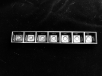 ASL280D40H7LED50G Групповая линейная линза на 7 светоточек с черным рефлектором, для светодиодов 3030/5630/5050, 93%, 50° wide beam. 7X1, 280мм H:20мм, PMMA ASAHI OPTICS pe521279 фото